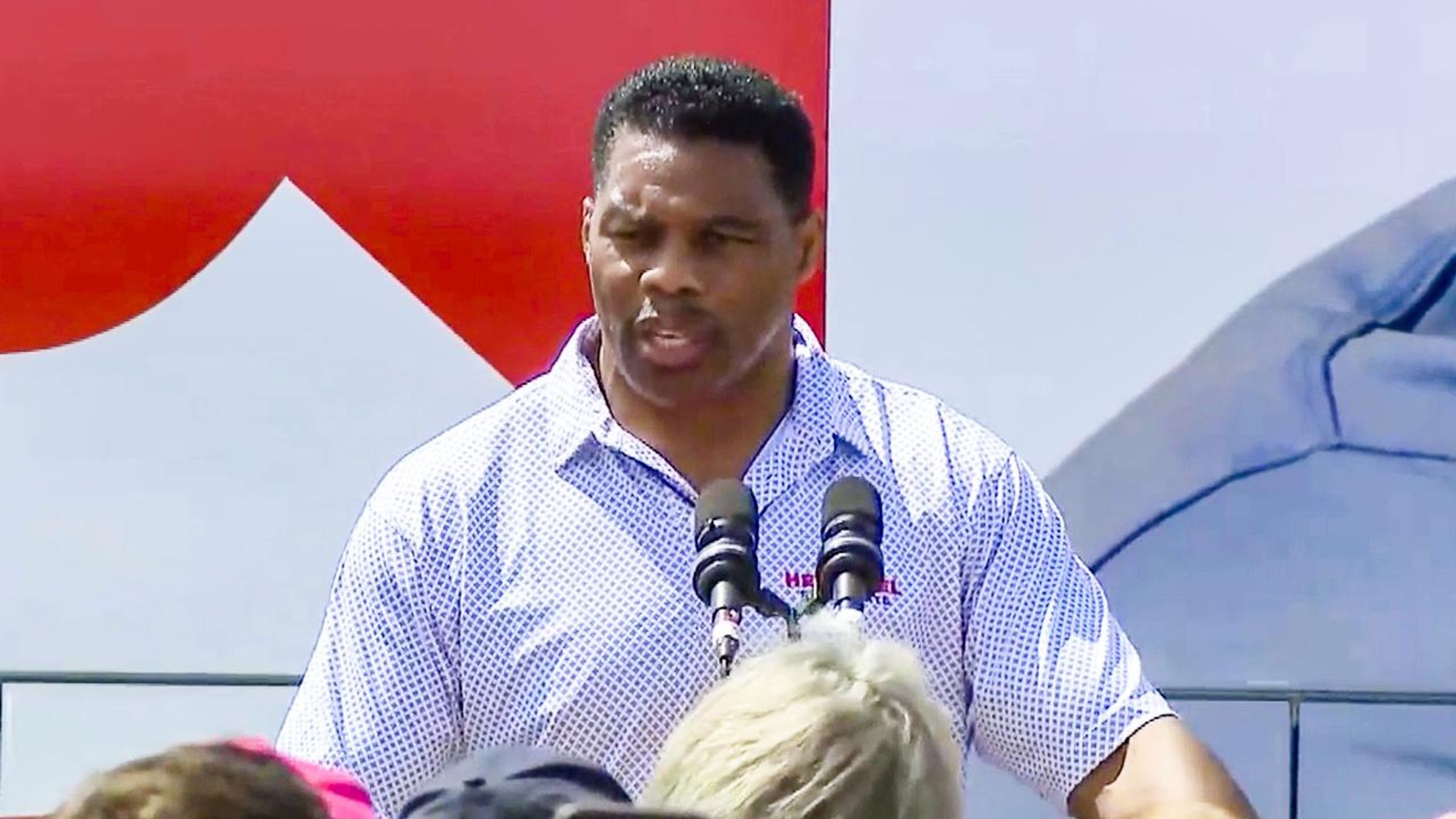 Herschel Walker Defines 'What A Woman Is' At Campaign Event Crooks
